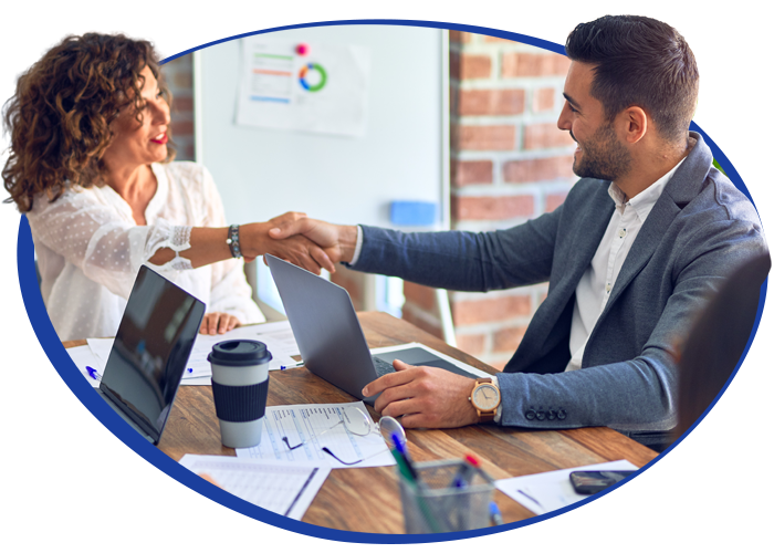 Illustration of a male and female business owners chaking hands at a coffee table.